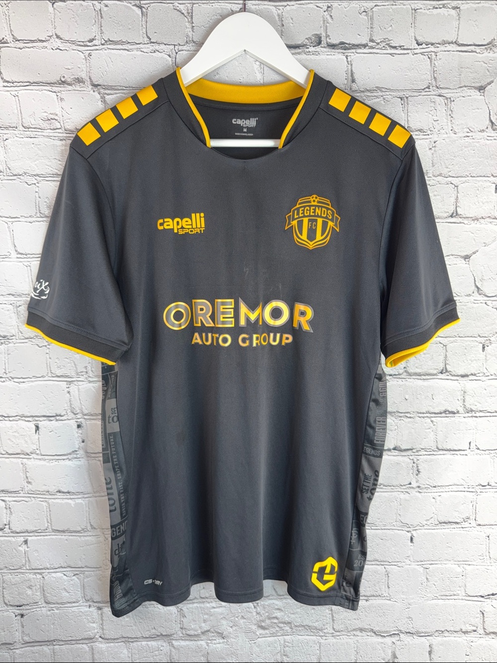 CAPELLI SPORT Legends FC Soccer Jersey Black Gold Performance Shirt NWOT
